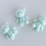 Fuzzy Sitting Teddy Bear (6 holtes)